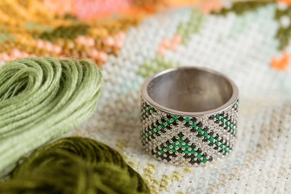 Silver ring with green gemstone — Stock Photo, Image