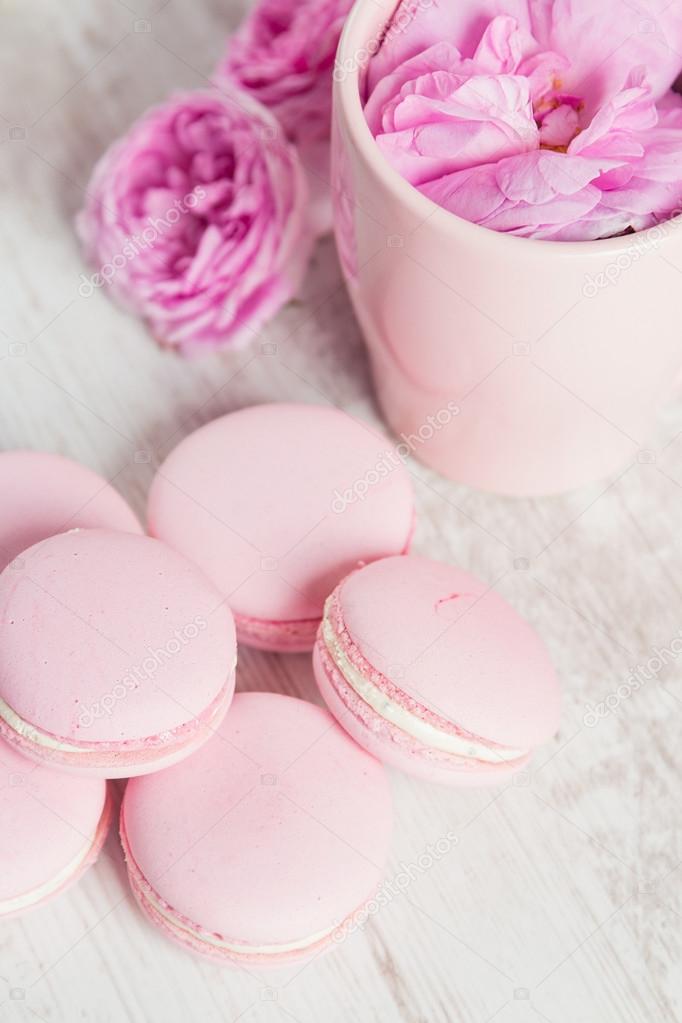 Tea cup with rose and pink macaroons