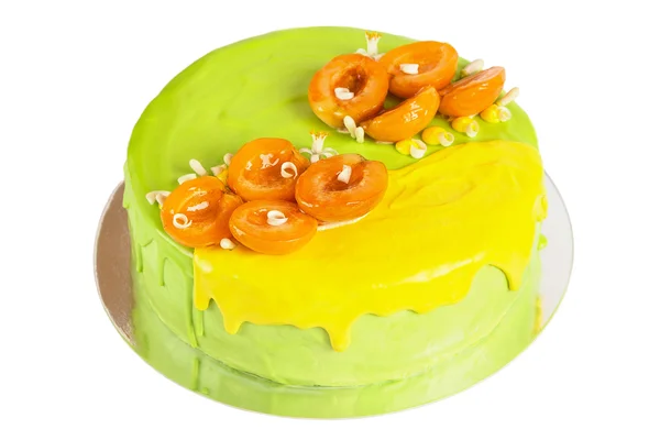 Groene en gele glazuur cake met abrikoos — Stockfoto