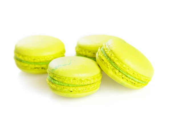 Yellow macaroons isolated on white, selective focus — Stock Photo, Image