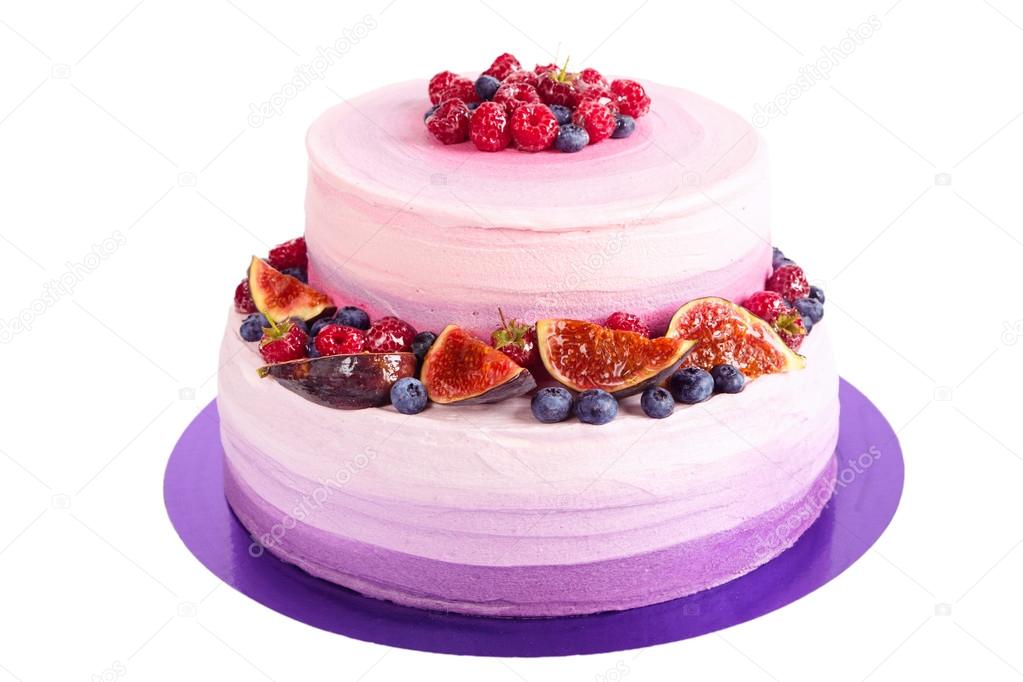 Purple cake with fruit isolated on white