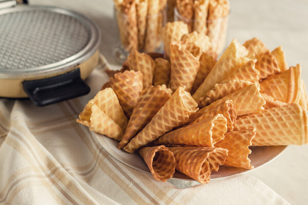 Waffle cones on plate. Top view