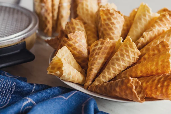 Waffle cones on plate. Top view — Stock Photo, Image