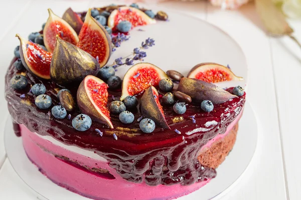 Decorated chocolate cake with lavender mousse — Stock Photo, Image