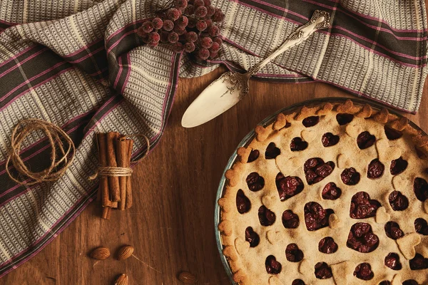 Homemade cherry pie on rustic background — Stock Photo, Image