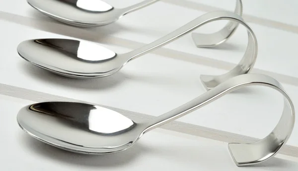 Empty spoon on table — Stock Photo, Image