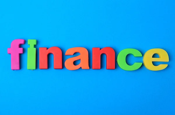 Slovo finance na pozadí — Stock fotografie