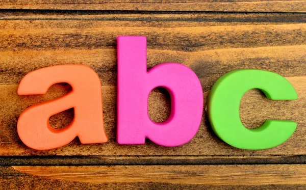 Palabra ABC en la mesa — Foto de Stock