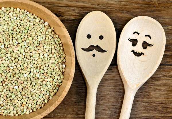 Green buckwheat in bowl — Stock Photo, Image