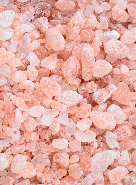 Гималайская розовая соль на заднем плане Стоковое Изображение