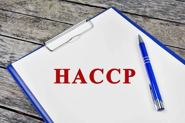 Haccp Πιστοποιηθηκε Κείμενο Λευκό Χαρτί Φόντο Ξύλου Close — Φωτογραφία Αρχείου