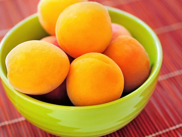 Bowl with apricot — Stock Photo, Image