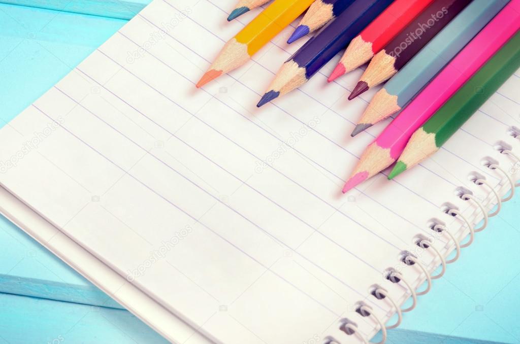 Colorful pencil with notepad