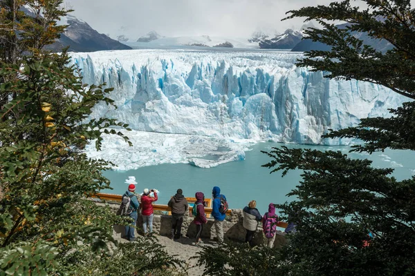 Tourists at the viewing platform admiring Perito Moreno Glacier Royalty Free Stock Photos