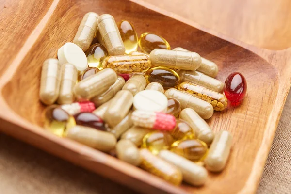 Different pills and supplements — Stock Photo, Image