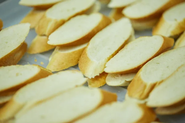 Sliced fresh baguette — Stock Photo, Image