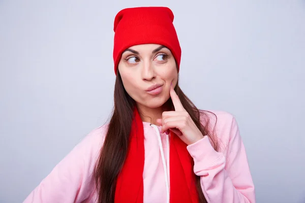Beautiful girl in red hat and scarf — Stock Photo, Image