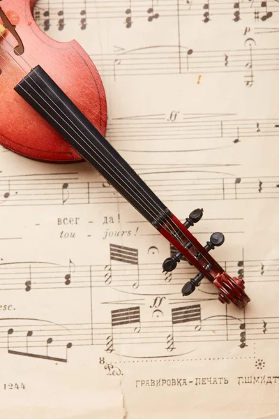 Violoncelo em notas musicais fundo — Fotografia de Stock