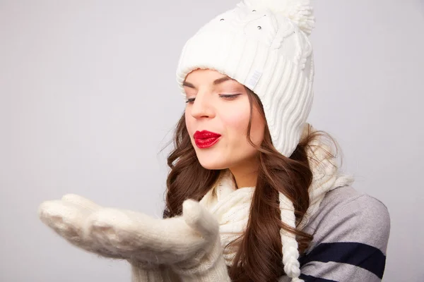 Portrait of a girl in a white hat and scarf — Stock Photo, Image