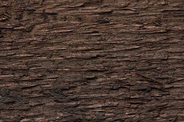 Texture of a dark wooden board — Stock Photo, Image