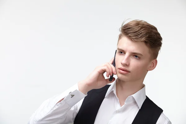 Joven hombre de negocios seguro con teléfono —  Fotos de Stock