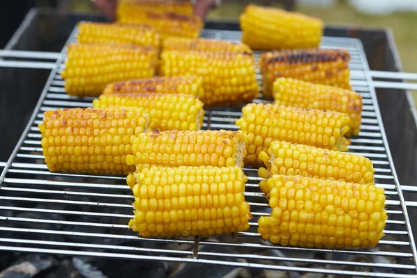 Sweet corn ears on grill