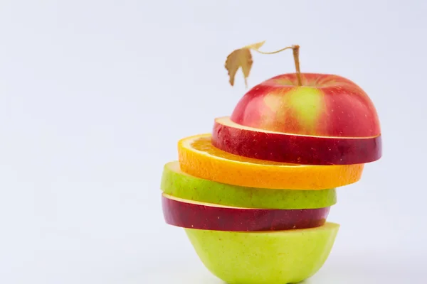 Frutta tagliata: mela, arancia, pera — Foto Stock