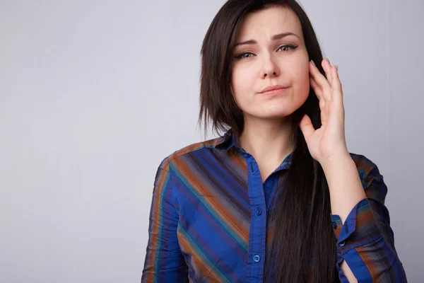 Beautiful brunette girl feels headache — Stock Photo, Image