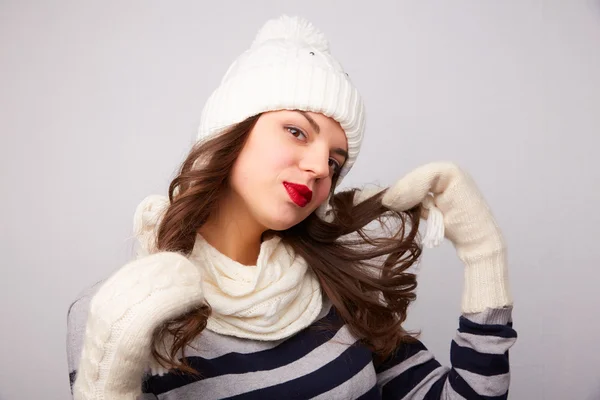 Girl in a white hat and scarf — Stock Photo, Image