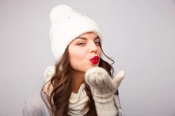Girl in a white hat and scarf — Stock Photo, Image