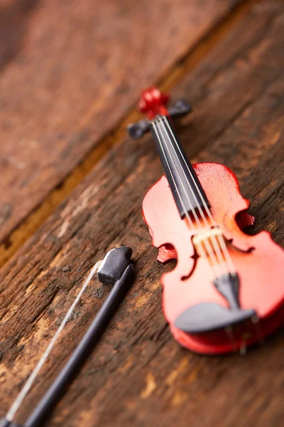 Violin on wooden board — Stock Photo, Image