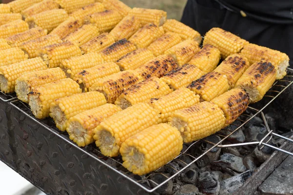 Sweet corn ears on grill