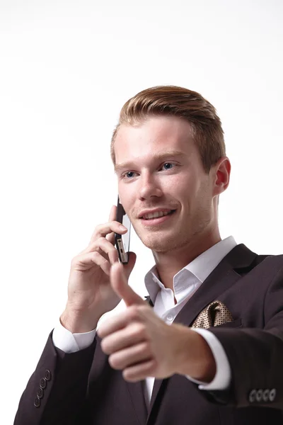 Giovane bell'uomo d'affari con telefono — Foto Stock