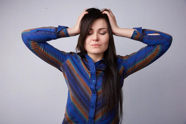 stock image Young beautiful brunette feels headache