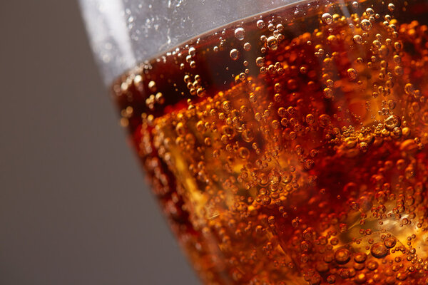 Whiskey with cola in glass