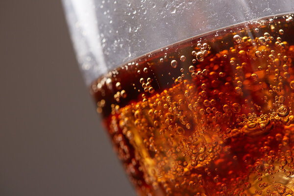 Whiskey with cola in glass