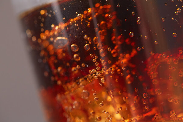Whiskey with cola in glass