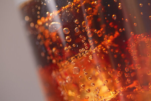 Whiskey with cola in glass