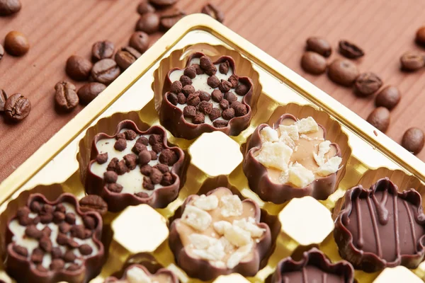 Chocolate candies with coffee beans — Stock Photo, Image