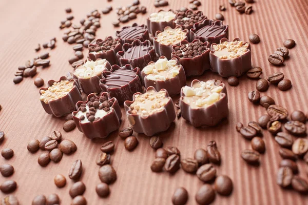 Chocolate candies with coffee beans — Stock Photo, Image