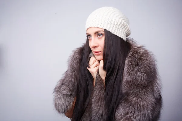 Woman in a fur coat — Stock Photo, Image