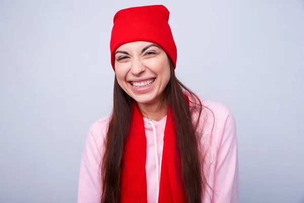 Beautiful girl in red hat and scarf — Stock Photo, Image