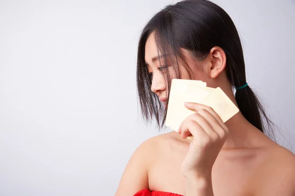 Chinese girl with gold cards — Stock Photo, Image