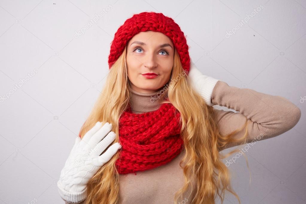 Blonde woman in red hat 