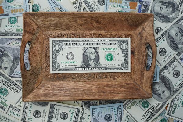 dollar bill on tray