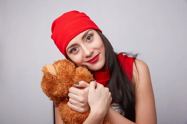 Brunette with a teddy bear — Stock Photo, Image