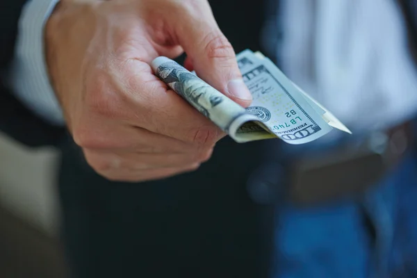 Businessman holding money — Stock Photo, Image