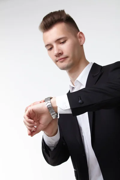 Businessman looking at watch — Stock Photo, Image