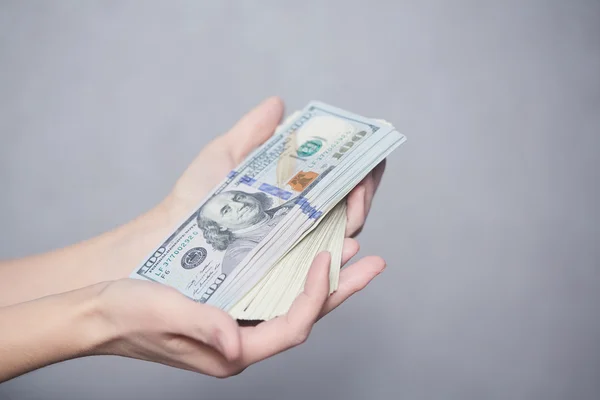 Money in female hands — Stock Photo, Image