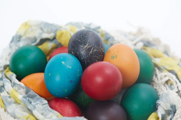 Easter eggs folded into fabric — Stock Photo, Image